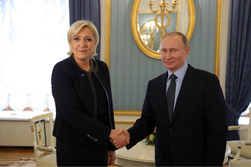 Marine le Pen, Vladimir Putin | © FN